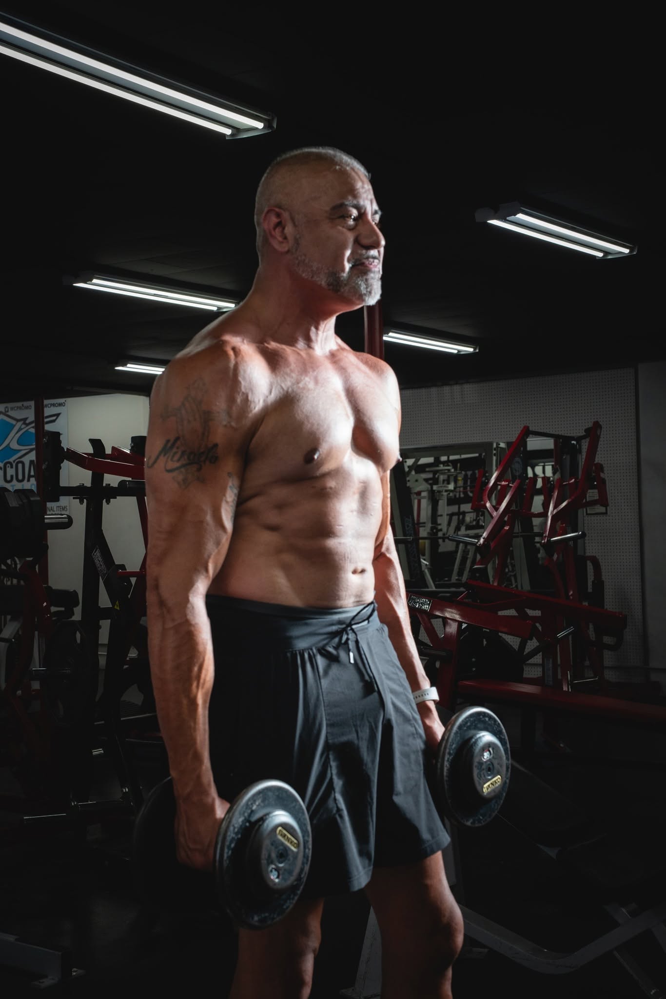 Ricardo performing a lat pulldown, back muscles engaged